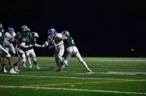 Sophomore Deon Vann fighting through contact late in the second half. Photo by Ben Ray/the Mirror