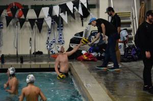 Jonathan Borte (ball in hand) stands next to Jake Davies warming up before their first game against Emerald Ridge. Photo by Ben Ray/Sound Publishing