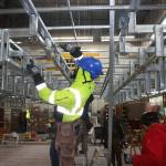 Martinze Johnson takes part in a training program at the Northwest Carpenters Institute of Washington center in Kent. STEVE HUNTER, Kent Reporter