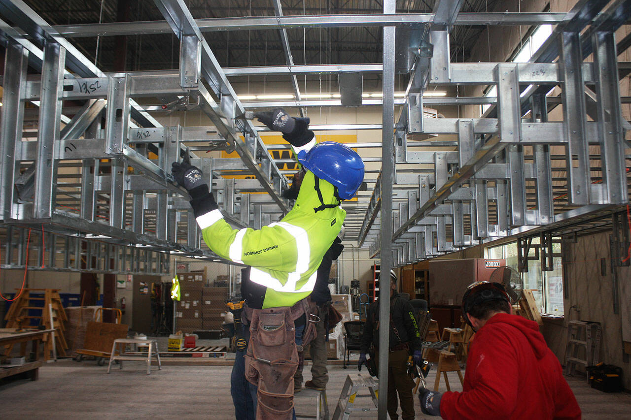 Martinze Johnson takes part in a training program at the Northwest Carpenters Institute of Washington center in Kent. STEVE HUNTER, Kent Reporter