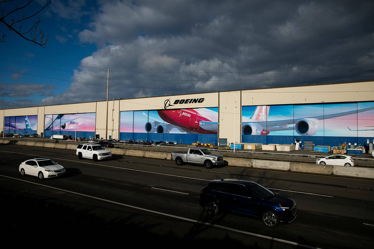 Traffic moves along Highway 526 in front of Boeings Everett Production Facility on Nov. 28, 2022, in Everett, Washington. (Olivia Vanni / Sound Publishing)