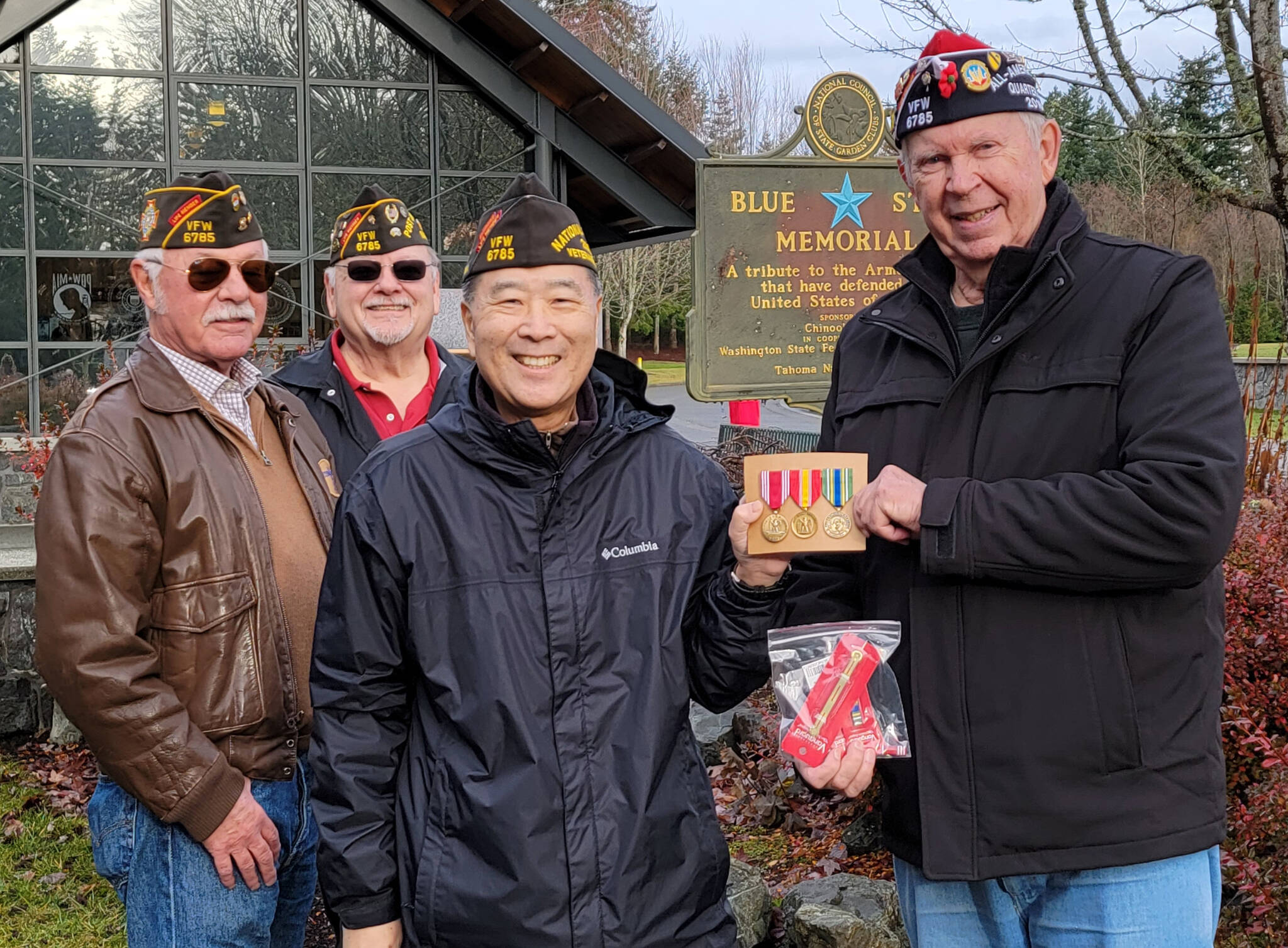 From left to right, Alan BHymer, USAF Korea Defense veteran; Richard Klug, USAF Vietnam War veteran; and Walt Tanimoto, US Army Iraq War veteran, honor Richard Sample, US Army Korea Defense veteran, with three awards. COURTESY PHOTO, VFW Post 6785