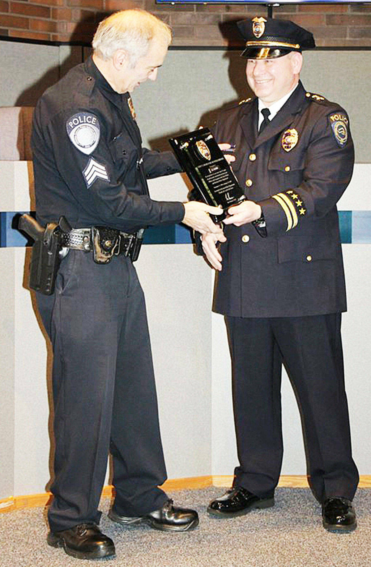 A article about Derek Kammerzell, right, was the third most viewed story in 2022 on the Kent Reporter website. COURTESY FILE PHOTO, Kent Police