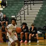 Chargers sophomore Jamari Harris drives to the basket. Photos by Ben Ray/Sound Publishing
