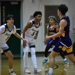 Freshman Brandon Tagle and sophomore Mason St. Louis of Kentwood are locking down the Wenatchee Panthers. Photos by Ben Ray/Kent Reporter