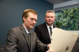 Rob Iddins (right), managing partner of Iddins Law Group in Kent. Call 253-854-1244 or visit iddinslaw.com/contact-us to request a complimentary 15 minute phone consultation. Charles Cotugno photo.