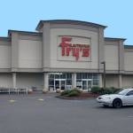 Frys Electronics in Renton permanently closed in 2021 and owners of the now vacant site seek to build housing and retail units over the next decade. Photo courtesy of Bay West Development