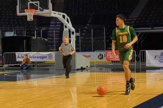 Kentridge senior Xzavier Randhawa brings the ball up the floor. Photos by Ben Ray/Kent Reporter