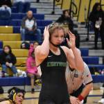 Kentwood senior Sarah Wright after her first win of the night. Photo Credit: Ben Ray/ The Reporter
Kentwood senior Sarah Wright after her first win of the night. Ben Ray/Sound Publishing
