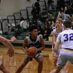 Kentwood leading score Mason St. Louis in action against Tahoma. Photo Credit: Ben Ray/ The Reporter