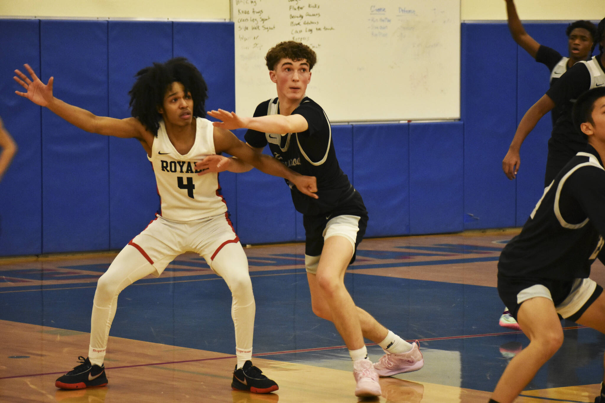 Kent-Meridian senior Tariq Hill and Kentwood junior Blake Stempniak each will be huge contributors to their teams playoff runs. BEN RAY, Sound Publishing