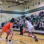 Kentwoods Mason St. Louis using a screen from freshman Brandon Tagle. Photos by Ben Ray/The Reporter