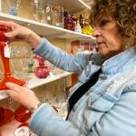 An attendee checks out the displays at a previous Green River Glass Show and Sale. This years show is Saturday, Feb. 25. COURTESY PHOTO, Green River Depression-Era Glass Club