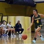 Kentridge junior Sydney Esperaza dribbles the ball down the floor. Ben Ray / The Reporter