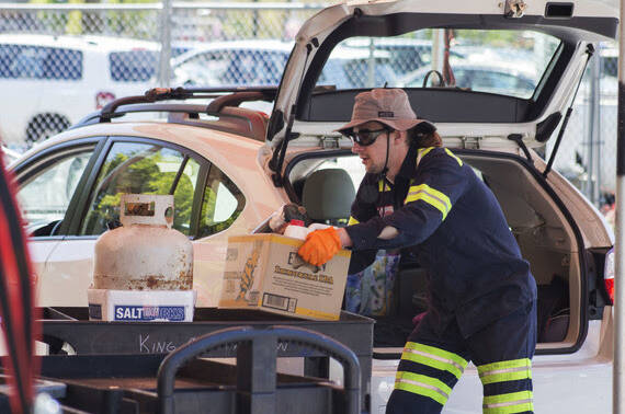 A crew member unloads hazardous waste items for the King County Wastemobile, which will be in Kent March 3-5. COURTESY PHOTO, King County
