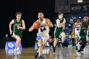 Eagle senior Jaylon Jenkins pushes the tempo for Federal Way. Ben Ray / Sound Publishing