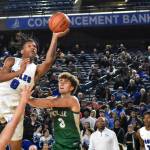 Federal Way senior Vaughn Weems absorbs the contact on his way to the rack. Ben Ray / Sound Publishing
