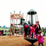 Kids try out the new play structure at Chestnut Ridge Park. (Screenshot from City of Kent Youtube page)