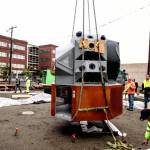 Elements of the citys interactive space-themed park being lowered in. (Screenshot from Kent Youtube page)