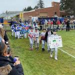 The opening day parade of Kent Little League players April 8 at Ryan Bruner Field. COURTESY PHOTO, Kent Little League