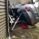 Firefighters use specialized jacks to stabilize the vehicle that crashed April 13 into a Kent apartment complex. COURTESY PHOTO, Puget Sound Fire