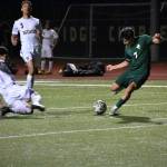 Kentridge senior Reyk Marcial makes a move on a Decatur defender. Ben Ray / The Reporter