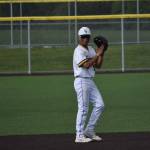Charger freshman Ricardo Del Fierro claps it up for his pitcher after a strikeout. Ben Ray / The Reporter