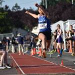 Cassandra Atkins in her second phase of her triple jump. Ben Ray/Sound Publishing