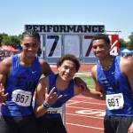 From right to left Julian Gene Fortin (3), Roman Hutchinson (1), Jaylon Jenkins (2) pose after sweeping the triple jump event.
