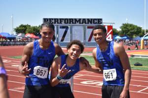 From right to left Julian Gene Fortin (3), Roman Hutchinson (1), Jaylon Jenkins (2) pose after sweeping the triple jump event.