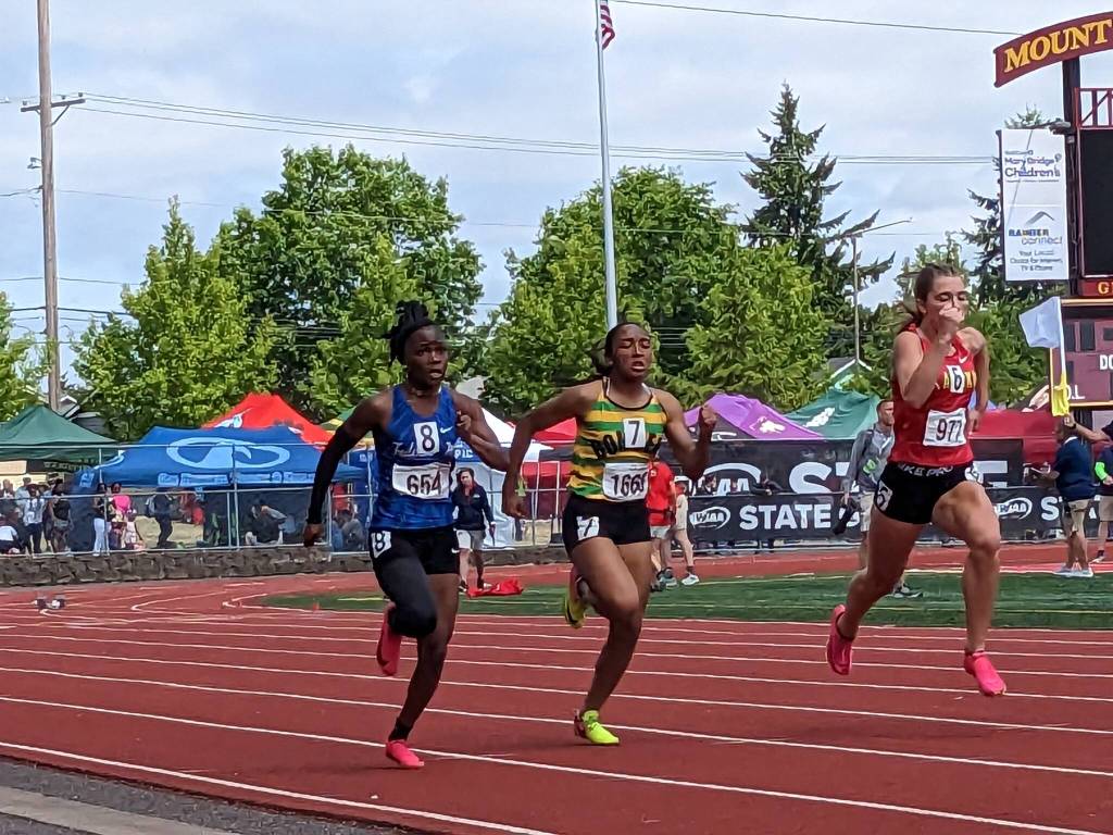 Soukhanya Waters in the 100-meter dash in the finals. Ben Ray/Sound Publishing