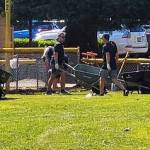 Crews work to clean up the Kent Little League fields. COURTESY PHOTO, Kent Little League