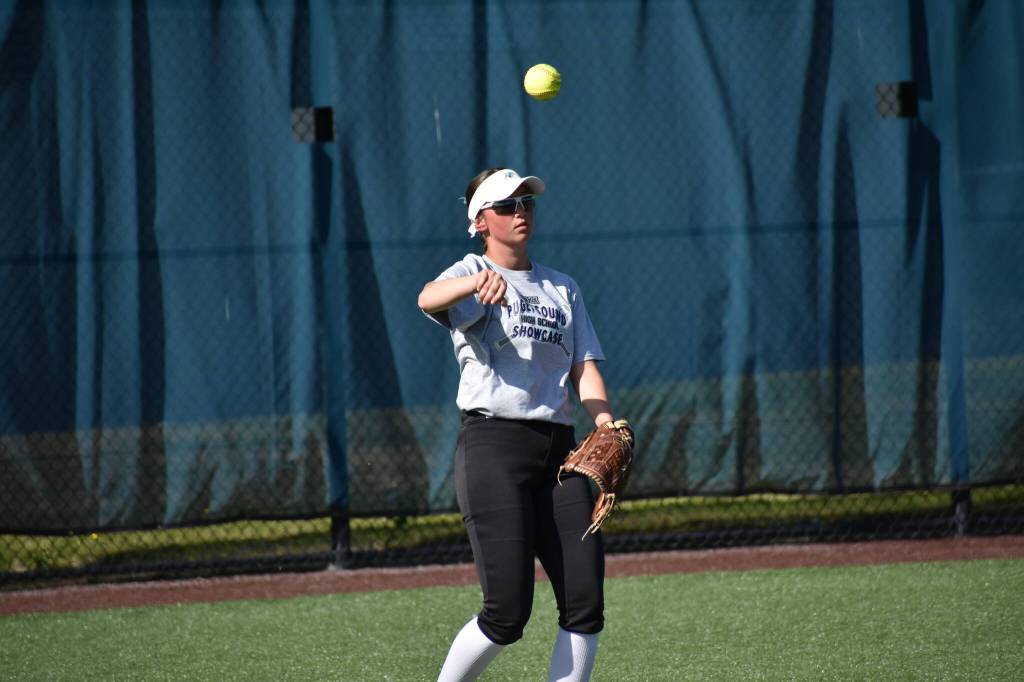 Riverside centerfielder Seneca Aarstad makes a throw to the infield. Ben Ray / The Reporter