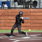 Kentwood utility player CJ Larson takes a ball in her at bat in the All-Star game. Ben Ray / The Reporter