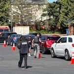 Vehicles line up to return guns June 3 at the Kent Police/Fire Training Center, 24523 116th Ave. SE. COURTESY PHOTO, Zandria Michaud, Kent Police