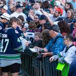 Dylan Guenther, left, and Lucas Ciona sign autographs. COURTESY PHOTO, Brian Liesse, Seattle Thunderbirds