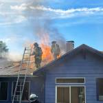 Firefighters battle a blaze June 7 at a Maple Valley house in the 20600 block of 223rd Place SE. COURTESY PHOTO, Puget Sound Fire