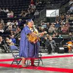 American Idol 2023 winner Iam Tongi, of Federal Way, a 2023 Decatur High School graduate, performs at Decaturs graduation June 12 at the accesso ShoWare Center in Kent. COURTESY PHOTO, Federal Way Public Schools