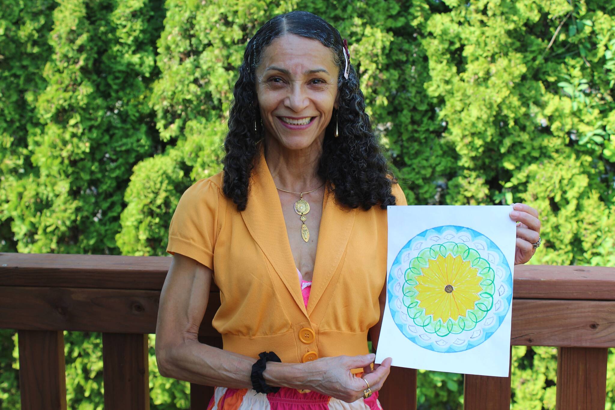 Ivone Langford, a Federal Way resident, holds her design that will be used at the upcoming Sound Transit link right rail Kent/Des Moines station. Alex Bruell/Sound Publishing