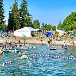 COURTESY PHOTO, City of Kent
Swimmers hit the water at Lake Meridian during the city of Kents Fourth of July Splash.