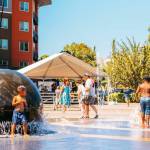 Children cool off at the Town Square Plaza fountains during Kent Cornucopia Days. COURTESY PHOTO, City of Kent