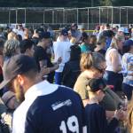 A crowd fills the outfield at a July 20 candlelight vigil for Gabriel Coury. STEVE HUNTER, Kent Reporter