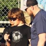 A friend talks about Gabriel Coury as Michael Coury looks on. STEVE HUNTER, Kent Reporter