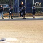 Kent Little League teammates of Gabriel Coury participate in the candlelight vigil. STEVE HUNTER, Kent Reporter