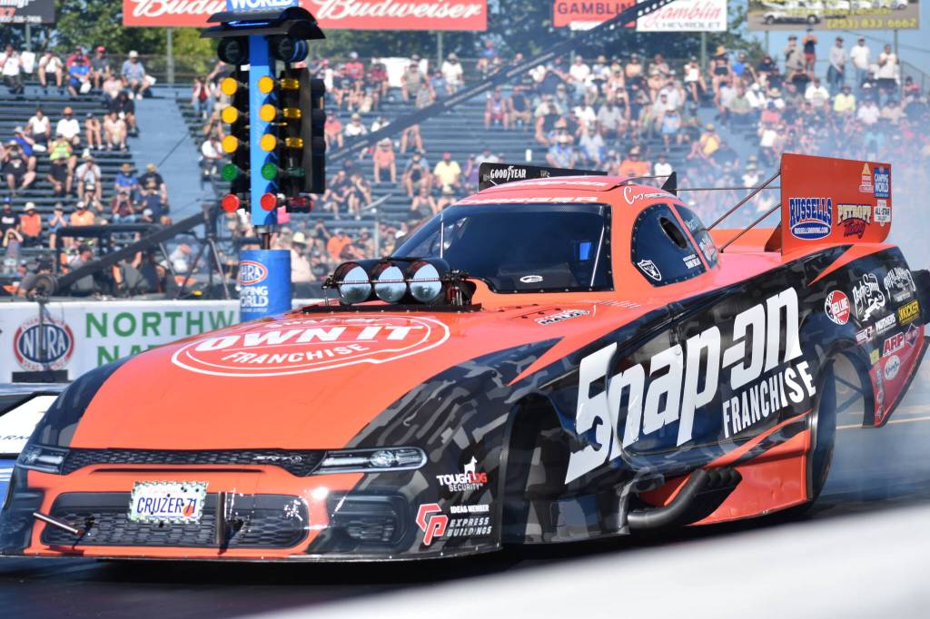 Nitro Funny Car driver Cruz Pedregon warms up his tires before the first run of qualifying. (Photos by Ben Ray / Sound Publishing)