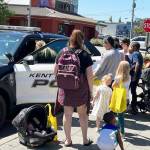 People get a chance to check out a Kent Police SUV during a National Night Out event Aug. 1 at the downtown Kent Library. COURTESY PHOTO, Kent Police