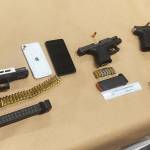 Seattle Police reported they found these guns after the arrest Aug. 16 of two felony suspects in Kent. COURTESY PHOTO, Seattle Police