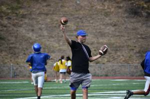Head Coach Randy Robbins working with wide receivers. Ben Ray / The Reporter