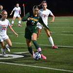 Senior Ella Schug with the ball at her feet. Ben Ray / The Reporter
