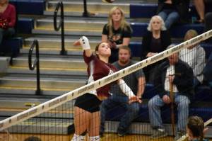 Freshman Kaylee Futch goes for a kill against the Ravens at Auburn Riverside. Ben Ray The Reporter